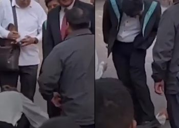 Limpian zapatos de café regado al Presidente de la SCJN antes de acto oficial